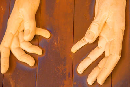 detail of statue of hands protruded toward the viewerの写真素材