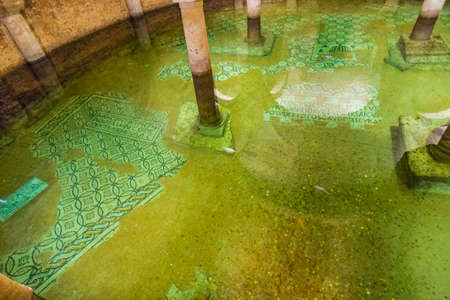 waterlogged crypt  below sea level with money, mosaics and columnsのeditorial素材