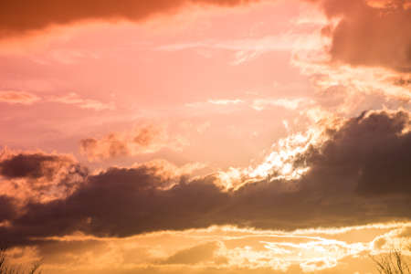 orange cloudy sky at sunsetの写真素材