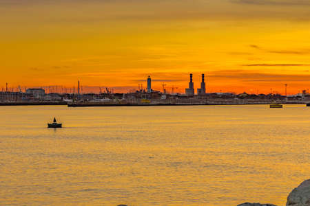 sunset on the Adriatic coast in Italyの写真素材