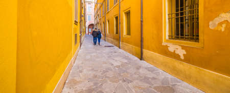 ancient buildings on street of Modena in Italy