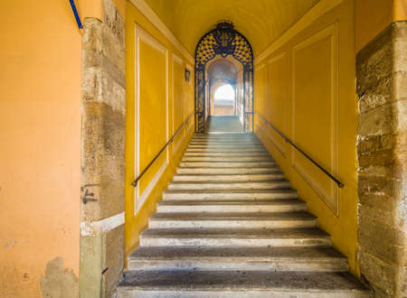 Ancient marble staircase to backlight exitの写真素材