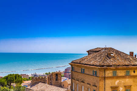 roofs of picturesque medieval village on the sea in Italyの写真素材