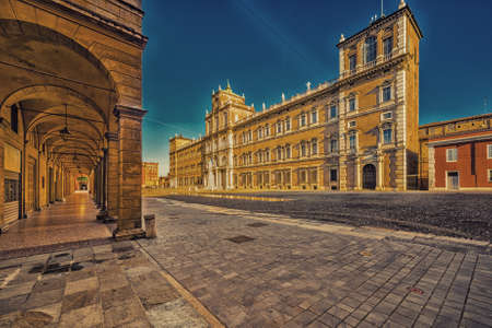 mirror of water of fountains in front of baroque Royal Palace in Modena, Italyのeditorial素材