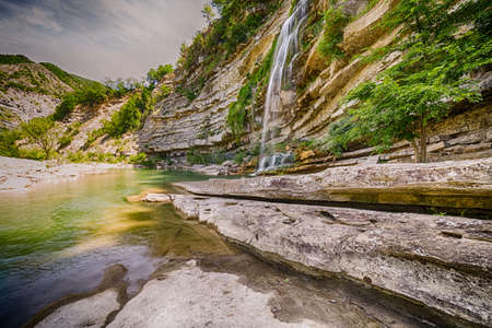 The stunning waterfalls of Fosso Canaglia, meaning Scoundrel Ditch, near Bologna in Italyの写真素材