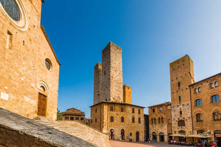 main public square of San Gimignano, wonderful medieval village in Tuscany, Italyの写真素材