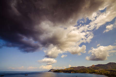 exciting panorama of clear and blue sea of Island of Elba under the sun of Tuscany in Italyの写真素材