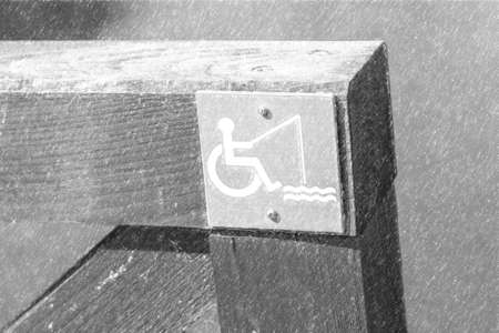 signal indicating the possibility for disabled people to fishの写真素材