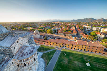 view of public Square of miracles in Pisa from the leaning tower, one of the most famous wonders of Italyの写真素材