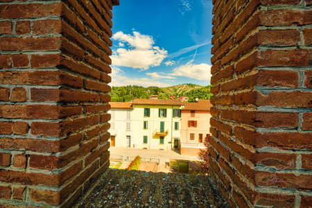bastions of medieval castle in Italian country villageの写真素材