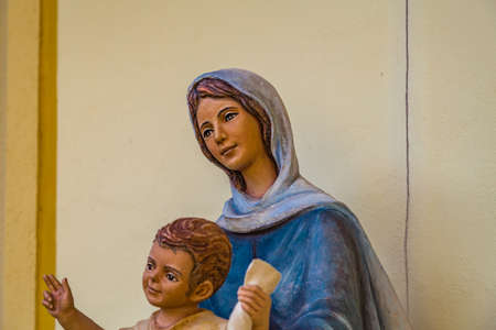 Statue of the Blessed Virgin Mary holding Holy Baby Jesusの写真素材