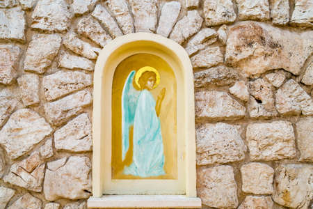 MEDJUGORJE, BOSNIA AND HERZEGOVINA - NOVEMBER 4:  painting of angel in Medjugorje, a popular destination for pilgrims on November 4, 2017. Every year millions of faithfuls go to Medjugorjeのeditorial素材