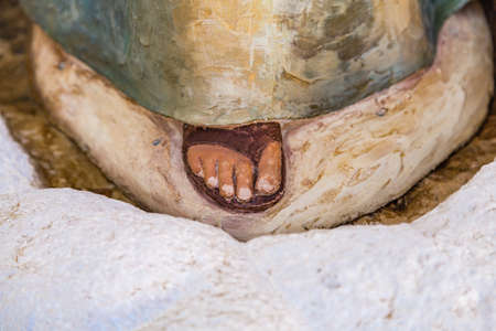 closeup of foot of statue of Our Lady of Medjugorje, the Blessed Virgin Mary,の写真素材