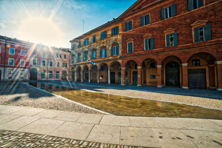mirror of water of fountains in front of baroque Royal Palace in Modena, Italyのeditorial素材