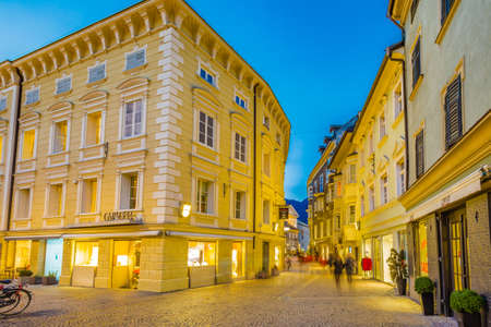 BRESSANONE, BOLZANO, ITALY - JANUARY 28: tourists walking in center of Bressanone at night on January 2016. the area of Bolzano is a popular destination in winterのeditorial素材