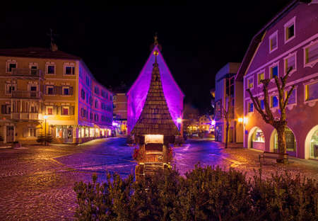 night view of center of typical mountain village in alpine valley in Italy