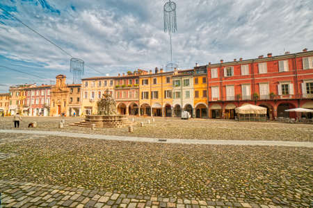 typical colorful buildings in main square of Cesena, undiscovered wonderful city of Italy