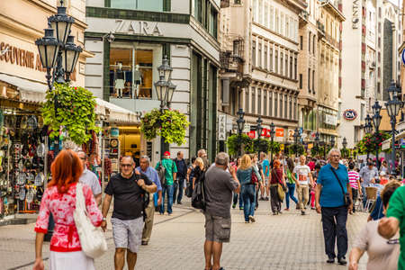 BUDAPEST, HUNGARY - SEPTEMBER 16, 2014: Tourists going shopping in Vaci Utca and other popular streets of historical center. Every year the number of tourists visiting Budapest increases.のeditorial素材