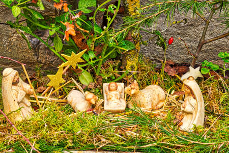 Christmas Nativity scene with The Holy Child, The Blessed Virgin Mary, Saint Joseph, ox and donkeyの写真素材