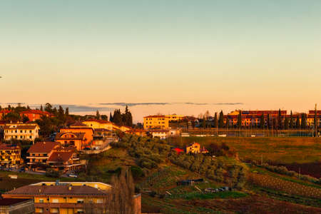 winter sunset on the roofs of  Italian village