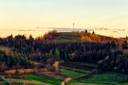 winter sunset on Italian hilly countrysideの写真素材