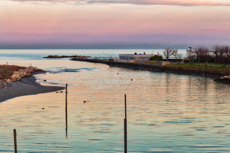 River empties into the Adriatic Sea in Italyの写真素材