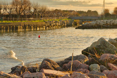 River empties into the Adriatic Sea in Italyの写真素材