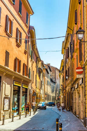 BOLOGNA, ITALY - AUGUST 27, 2016: on Saturday morning, few tourists and locals walk in the streets of historical centerのeditorial素材