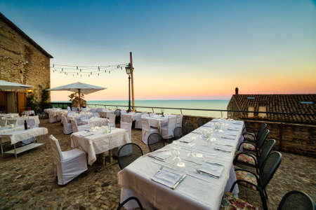Italian Restaurant with sea view at sunsetのeditorial素材