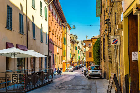 BOLOGNA, ITALY - AUGUST 27, 2016: on Saturday morning, few tourists and locals walk in the streets of historical centerのeditorial素材
