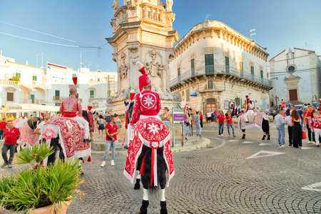 OSTUNI (BR) - AUGUST 28, 2016: Tourists and locals attend and enjoy the feast of the patron saint of the cityのeditorial素材