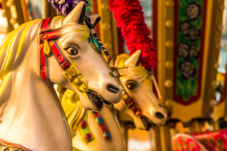closeup of colorful Carousel Horsesの写真素材