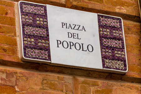 RAVENNA, ITALY - FEBRUARY 15, 2018: The municipality of Ravenna adopted artistic plaques with mosaics in the streets and squares of the old Townのeditorial素材