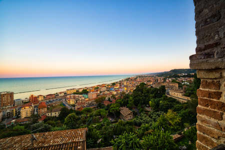 roofs of picturesque village on the sea in Italyの写真素材