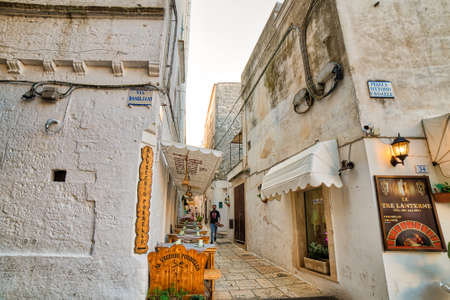 CISTERNINO (BR) - AUGUST 25, 2016: Italian Touring Club confirmed to award Cisternino with Orange Flag, the environmental tourism quality mark because of excellent offer and quality hospitalityのeditorial素材