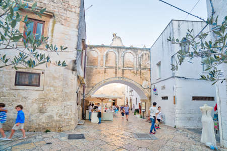 OSTUNI (BR), ITALY - AUGUST 29, 2016: The mayor issued the Ordinance to whitewash the facades of the houses with lime milk to keep the historic whiteness of Ostuniのeditorial素材