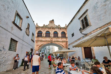 OSTUNI (BR), ITALY - AUGUST 29, 2016: The mayor issued the Ordinance to whitewash the facades of the houses with lime milk to keep the historic whiteness of Ostuniのeditorial素材