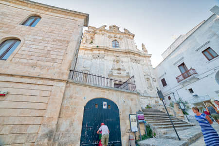 OSTUNI (BR), ITALY - AUGUST 29, 2016: The mayor issued the Ordinance to whitewash the facades of the houses with lime milk to keep the historic whiteness of Ostuniのeditorial素材