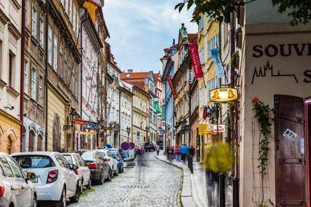PRAGUE, CZECH REPUBLIC - AUGUST 26, 2014: locals and tourists walk in street in the historical center of Pragueのeditorial素材