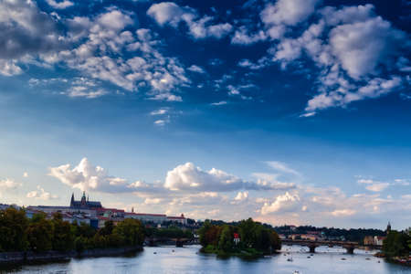 cloudy sky on cityscape of Pragueの写真素材
