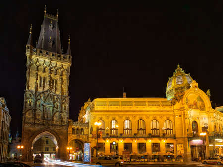 PRAGUE, CZECH REPUBLIC - AUGUST 27, 2014: car traffic moves in front of Municipal House and Powder Tower in Pragueのeditorial素材