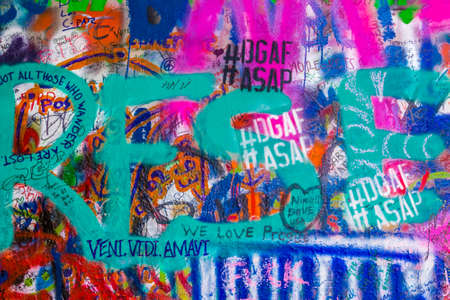 PRAGUE, CZECH - AUGUST 28, 2014: the Lennon wall is a symbol for young people who keeps on drawing graffiti inspired by John Lennon and Beatles lyricsのeditorial素材