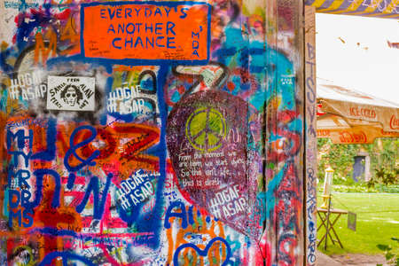 PRAGUE, CZECH - AUGUST 28, 2014: the Lennon wall is a symbol for young people who keeps on drawing graffiti inspired by John Lennon and Beatles lyricsのeditorial素材