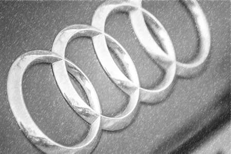 RAVENNA, ITALY - FEBRUARY 15, 2018:  dirt covers the AUDI logo. Audi recalled 127,000 luxury diesel cars after claims they were fitted with emission-cheating devices. illustrationのeditorial素材