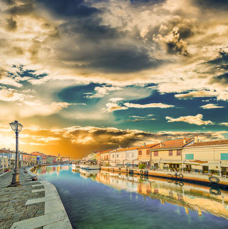 Sunset on channel port designed by Leonardo Da Vinci in Italyの写真素材