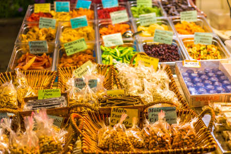 CERVIA (RA), ITALY - JUNE 8, 2018: at the opening of the sunny season , stalls sell to tourists dried fruit and seeds to eat while they shopのeditorial素材