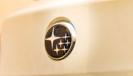 LUGO (RA), ITALY - JUNE 24, 2018: Dirt and dust cover the SUBARU logo on a car body