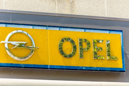 FAENZA (RA), ITALY - JUNE 23, 2018: Dirt and dust cover the OPEL logo on dealer signboardのeditorial素材