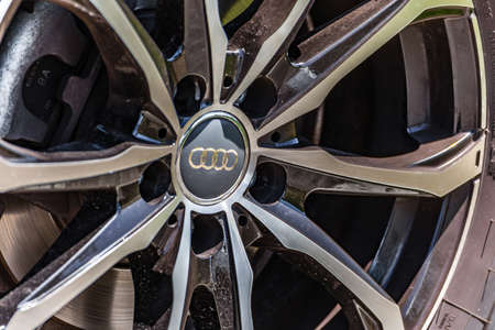RAVENNA, ITALY - JUNE 30, 2018: Dirt and dust cover the AUDI logo on an alloy wheel
