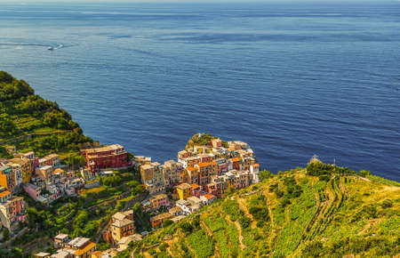 colorful fishing houses in Italian sea townの写真素材